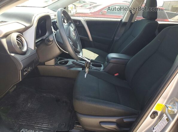 2T3ZFREVXJW519570 2018 TOYOTA RAV4 Silver Front interior view