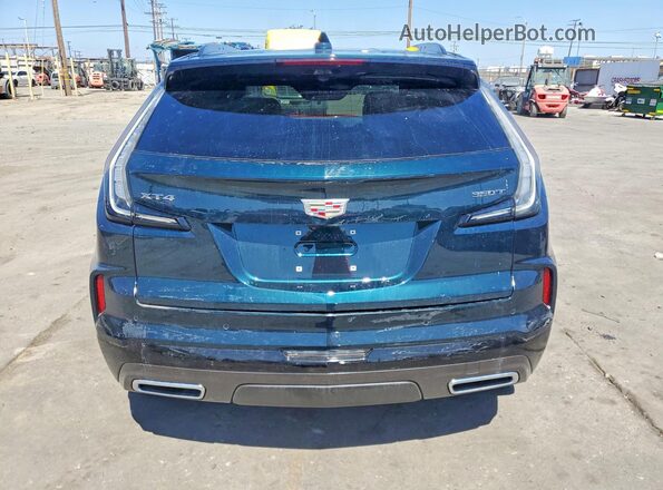 1GYFZER46SF159327 2025 CADILLAC XT4 Green Front interior view