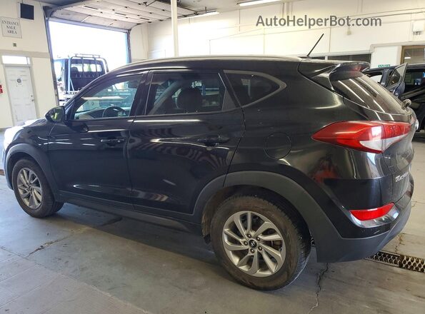 KM8J3CA49GU142764 2016 HYUNDAI TUCSON Black 