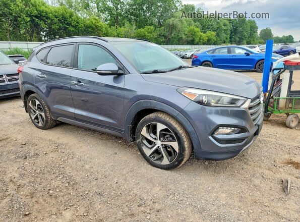 KM8J3CA23GU044036 2016 HYUNDAI TUCSON Gray წინა ხედი
