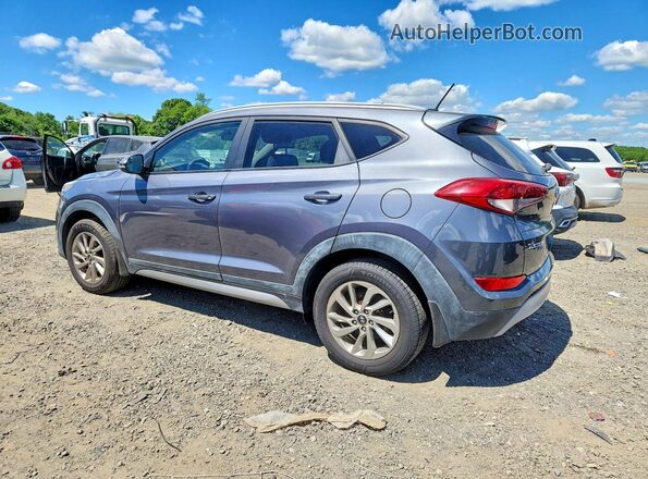 KM8J3CA21HU288141 2017 HYUNDAI TUCSON Серый 