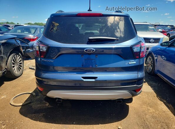 1FMCU0GD4JUA80693 2018 FORD ESCAPE Blue Widok wnętrza z przodu
