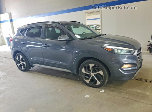 KM8J3CA20JU823336 2018 HYUNDAI TUCSON Gray წინა ხედი