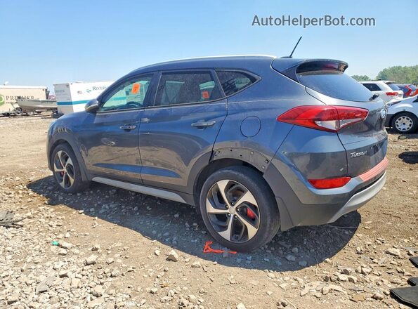 KM8J3CA24HU390226 2017 HYUNDAI TUCSON Gray 
