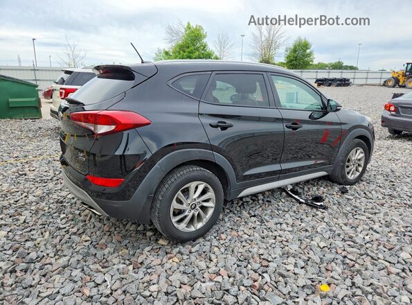 KM8J3CA23HU576503 2017 HYUNDAI TUCSON Black Front right