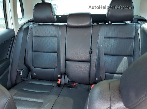 WVGAV7AX7GW564189 2016 VOLKSWAGEN TIGUAN White Vista interior trasera