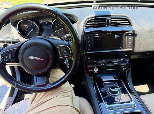 SAJAJ4FX4JCP25812 2018 JAGUAR XF White Rear seats view