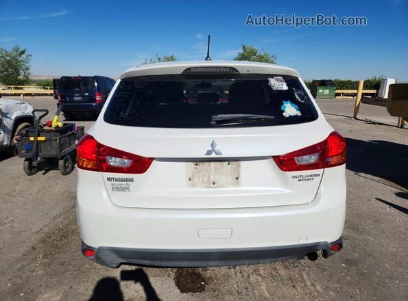 JA4AP3AU2GZ048053 2016 MITSUBISHI OUTLANDER White Front interior view