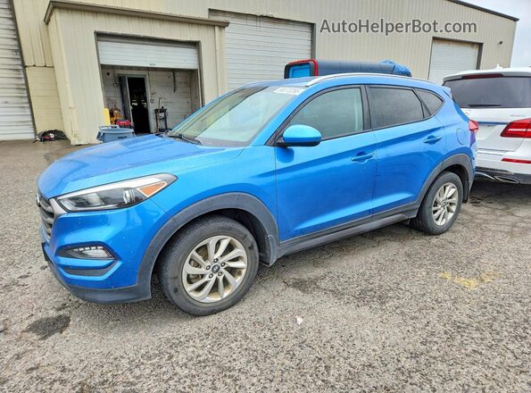 KM8J3CA4XGU228648 2016 HYUNDAI TUCSON Blue 