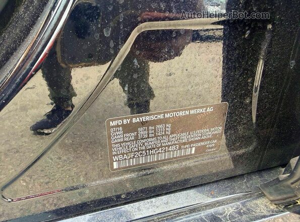 WBA7F2C51HG421483 2017 BMW 7 SERIES Синий Вид задней части салона
