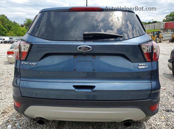 1FMCU9HD3JUA89873 2018 FORD ESCAPE Синий Вид салона спереди