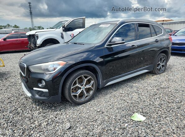 WBXHU7C30J3H43138 2018 BMW X1 Black Trasero izquierdo