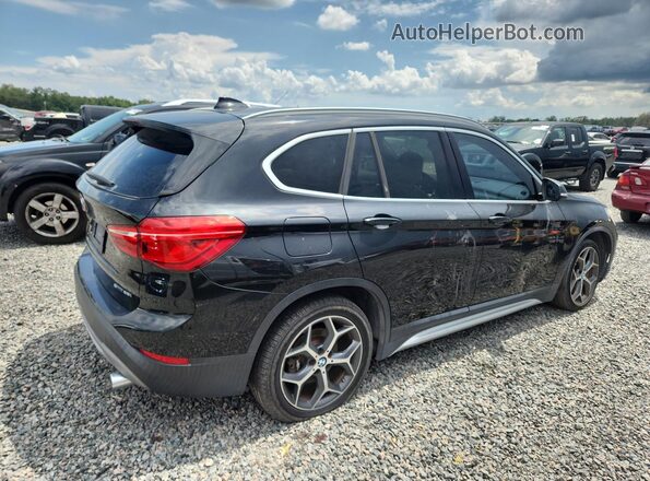 WBXHU7C30J3H43138 2018 BMW X1 Black Delantero derecho