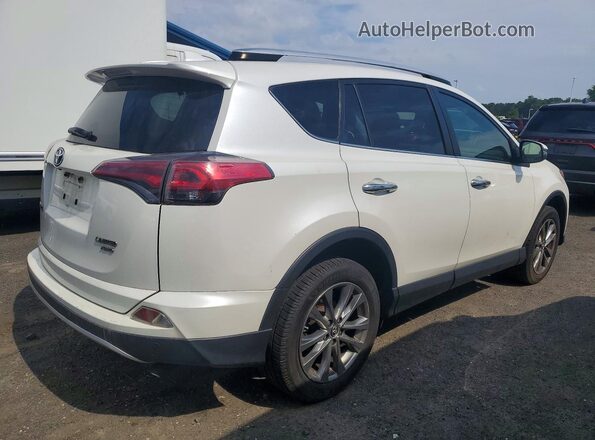 JTMDFREVXGJ054886 2016 TOYOTA RAV4 White 