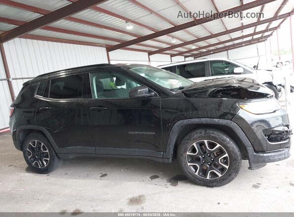 3C4NJCAB9JT411339 2018 JEEP COMPASS Black Widok wnętrza z tyłu