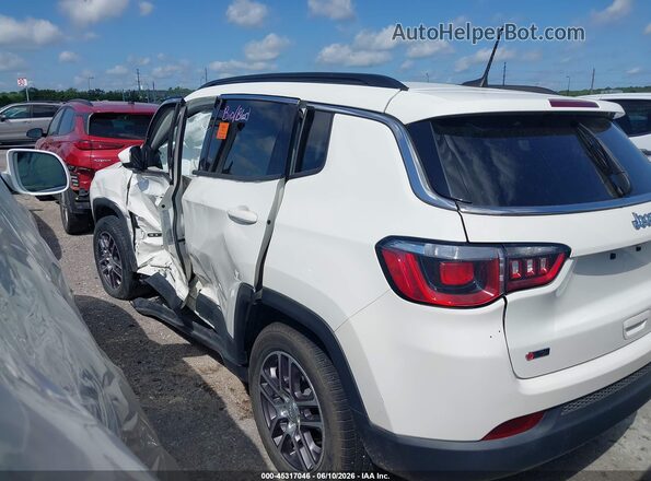 3C4NJCBB9LT206007 2020 JEEP COMPASS White Вид задньої частини салону