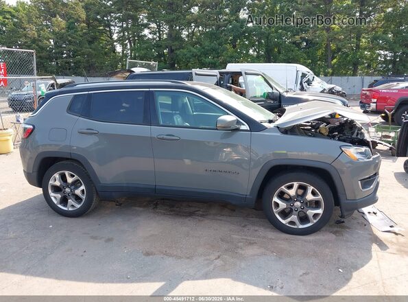 3C4NJCCB1KT749090 2019 JEEP COMPASS Gray Rear interior view