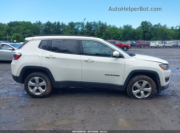 3C4NJDBB2KT754631 2019 JEEP COMPASS White Widok wnętrza z tyłu