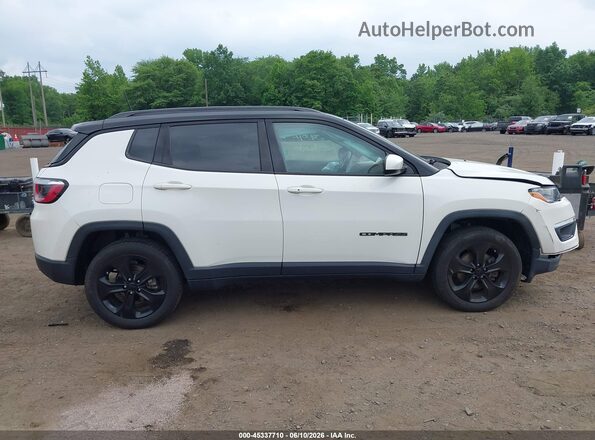 3C4NJDBB8LT129877 2020 JEEP COMPASS White Rear interior view