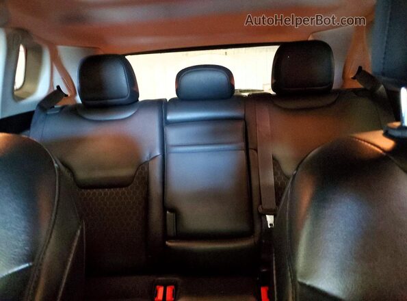 3C4NJDBB9JT313660 2018 JEEP COMPASS Silver Vista de los asientos traseros