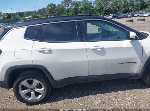 3C4NJDBB9KT653456 2019 JEEP COMPASS Silver Սալոնի հետևի տեսք