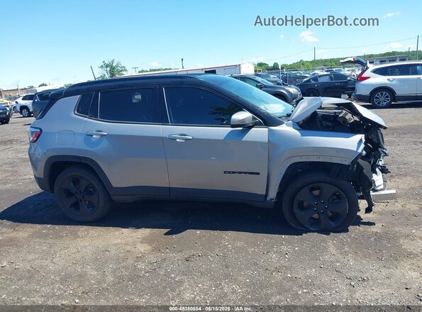 3C4NJDBB9LT139611 2020 JEEP COMPASS Silver Вид задньої частини салону