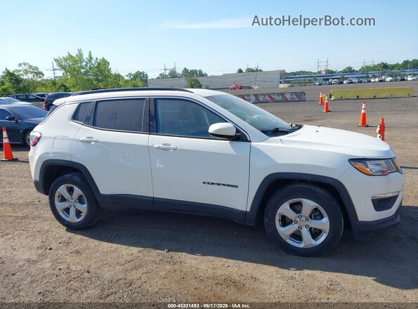 3C4NJDBBXLT138628 2020 JEEP COMPASS White Սալոնի հետևի տեսք