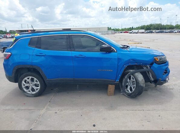 3C4NJDBN9RT129390 2024 JEEP COMPASS Blue Vista interior trasera