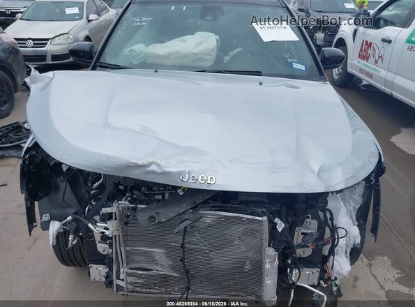 3C4NJDCN8ST561182 2025 JEEP COMPASS Silver Вид задньої частини салону
