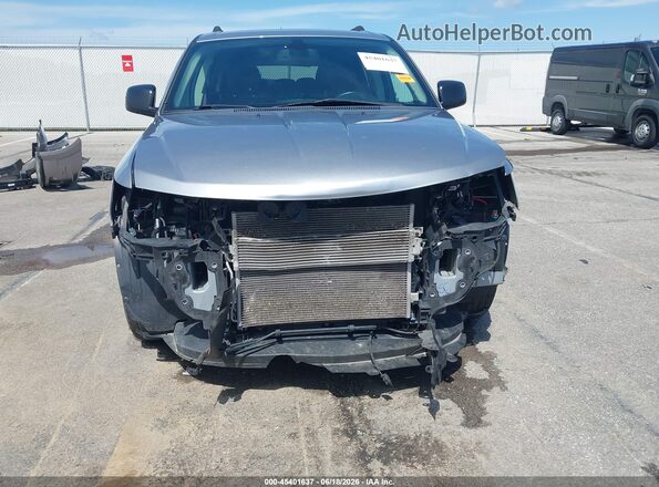 3C4PDCAB9JT530069 2018 DODGE JOURNEY Silver Vista interior trasera