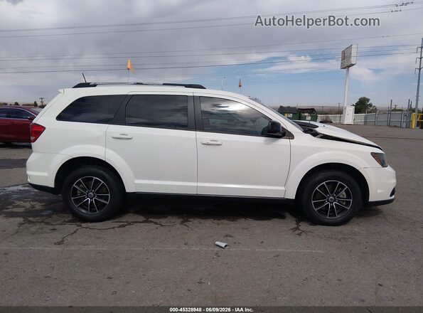 3C4PDCBB6KT719729 2019 DODGE JOURNEY White Widok wnętrza z tyłu