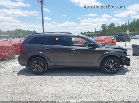 3C4PDCBG6JT507231 2018 DODGE JOURNEY Gray Widok wnętrza z tyłu
