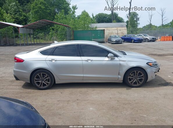3FA6P0CD5KR180556 2019 FORD FUSION Silver Սալոնի հետևի տեսք
