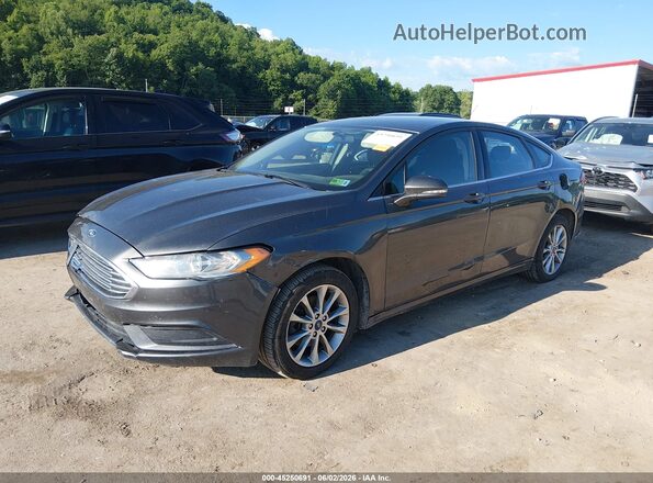 3FA6P0HD0HR123585 2017 FORD FUSION Gray Vista tres cuartos delantera izquierda