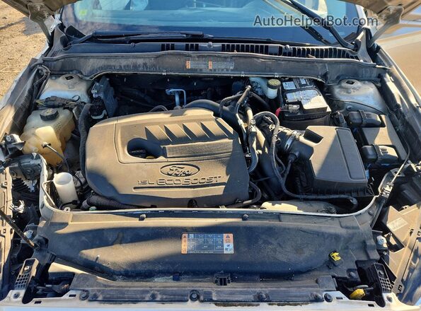3FA6P0HD2HR404979 2017 FORD FUSION Gold Rear interior view