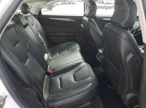 3FA6P0K95GR320304 2016 FORD FUSION White Vista de los asientos traseros