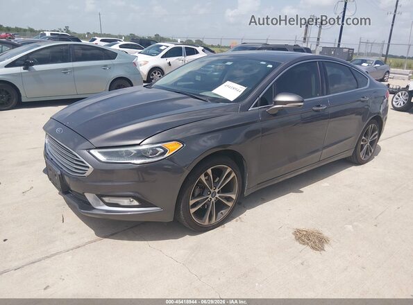 3FA6P0K96HR214834 2017 FORD FUSION Gray Vista tres cuartos delantera izquierda