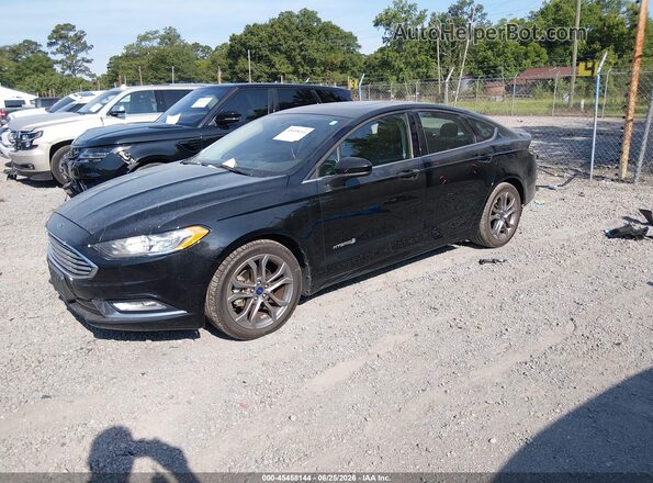 3FA6P0LU3HR300217 2017 FORD FUSION HYBRID Black Vista tres cuartos delantera izquierda