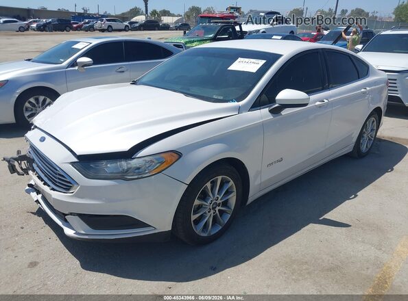 3FA6P0LU4HR217606 2017 FORD FUSION HYBRID White Front left