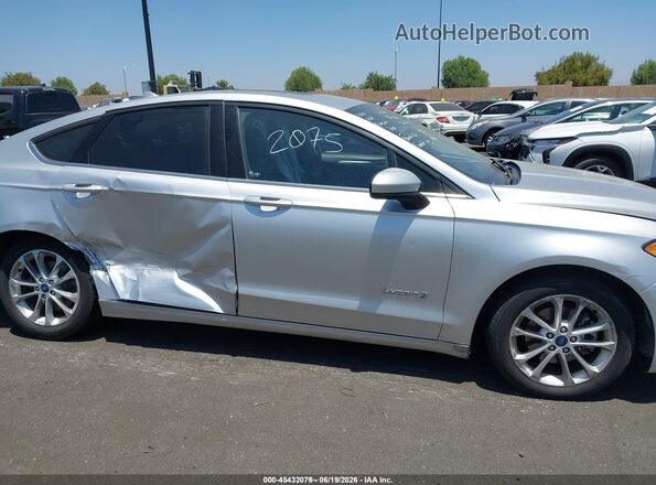 3FA6P0LU7KR135120 2019 FORD FUSION HYBRID Silver Vista interior trasera