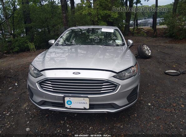 3FA6P0LUXKR129554 2019 FORD FUSION HYBRID Silver Вид задньої частини салону
