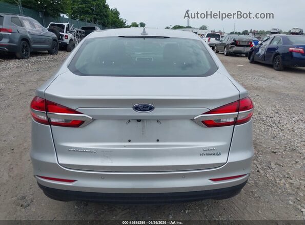 3FA6P0MU2KR255230 2019 FORD FUSION HYBRID Серебряный 