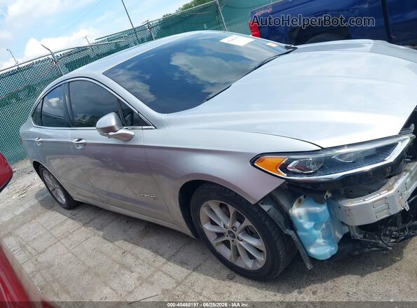3FA6P0MU2KR262470 2019 FORD FUSION HYBRID Silver Vista interior trasera