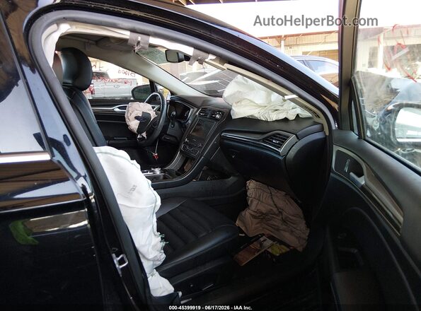 3FA6P0MUXKR185461 2019 FORD FUSION HYBRID Черный Вид салона спереди