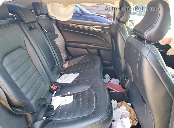 3FA6P0PU8JR232643 2018 FORD FUSION Black Vista de los asientos traseros