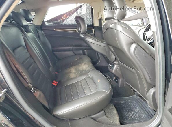 3FA6P0PU9GR229033 2016 FORD FUSION Black Vista de los asientos traseros