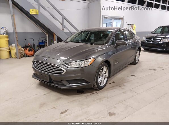 3FA6P0UU2JR271460 2018 FORD FUSION HYBRID Gray Vista tres cuartos delantera izquierda