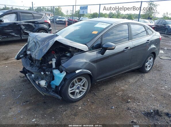3FADP4BJ5JM134694 2018 FORD FIESTA Gray Vista tres cuartos delantera izquierda