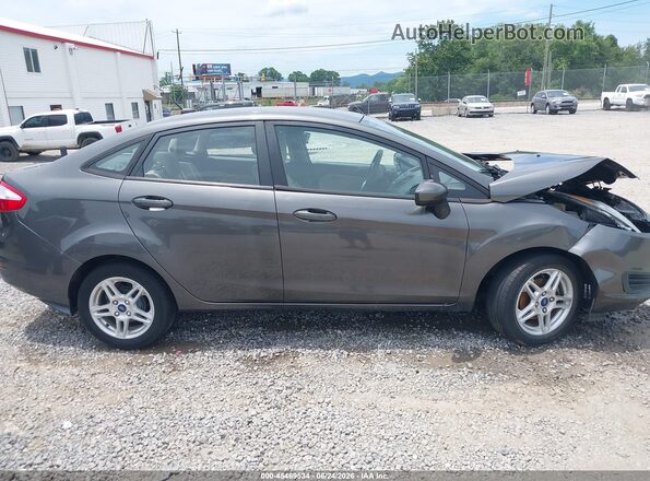 3FADP4BJ7JM107979 2018 FORD FIESTA Gray Սալոնի հետևի տեսք