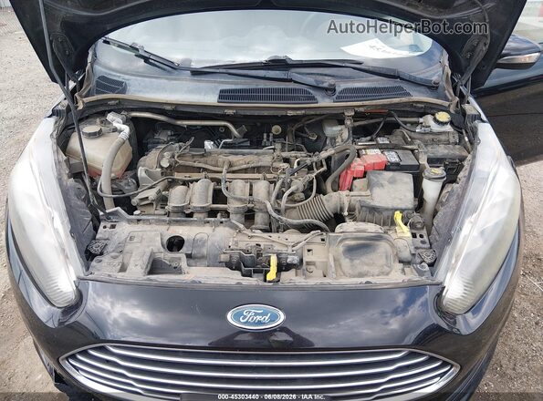 3FADP4BJ7JM131523 2018 FORD FIESTA Black Rear view